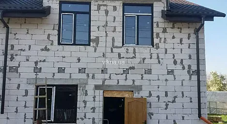 Вікна Rehau «антрацит» для будинку - головне фото